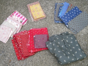 Various fabrics to be used in Juliette's quilt.